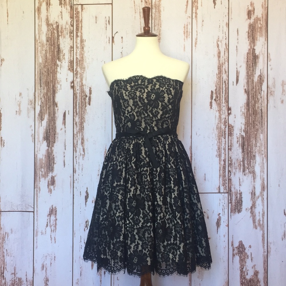 Lace overlay black dress by Robert Rodriguez